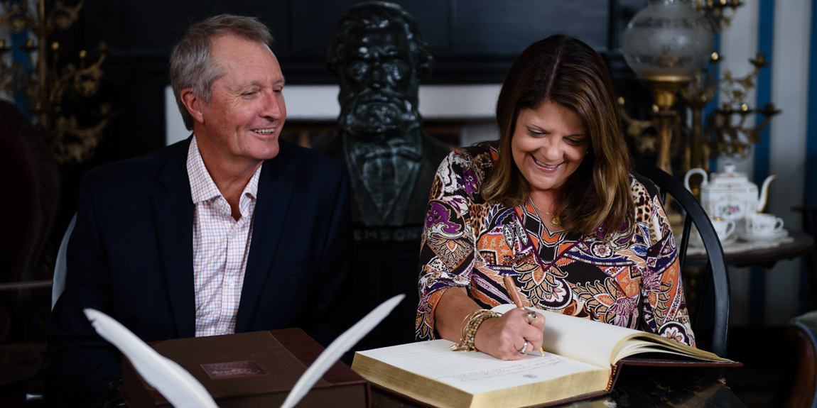 Clemson Legacy Society members signing the Clemson Legacy Society Registry.